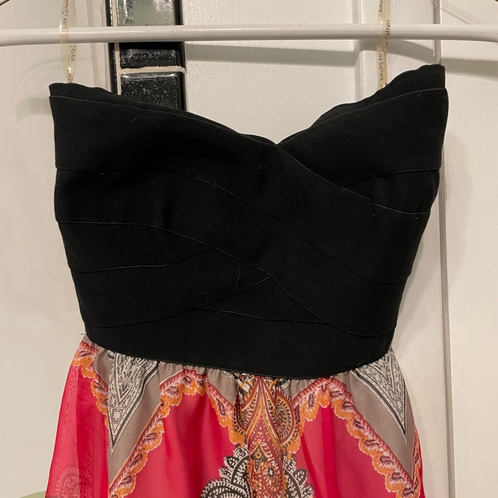 Black and paisley sleeveless dress